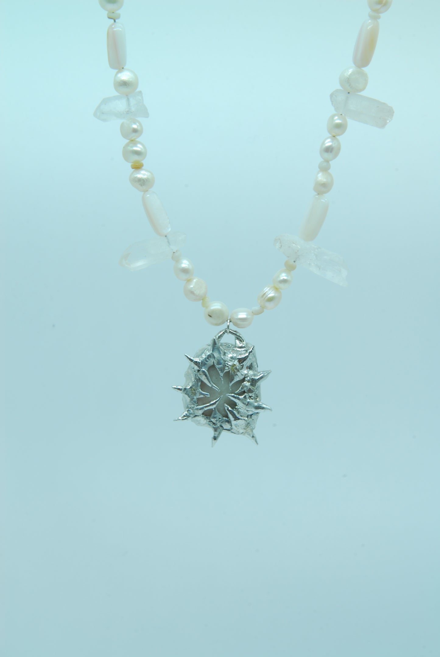 „Ikarus“ -Monoklin pearl chain