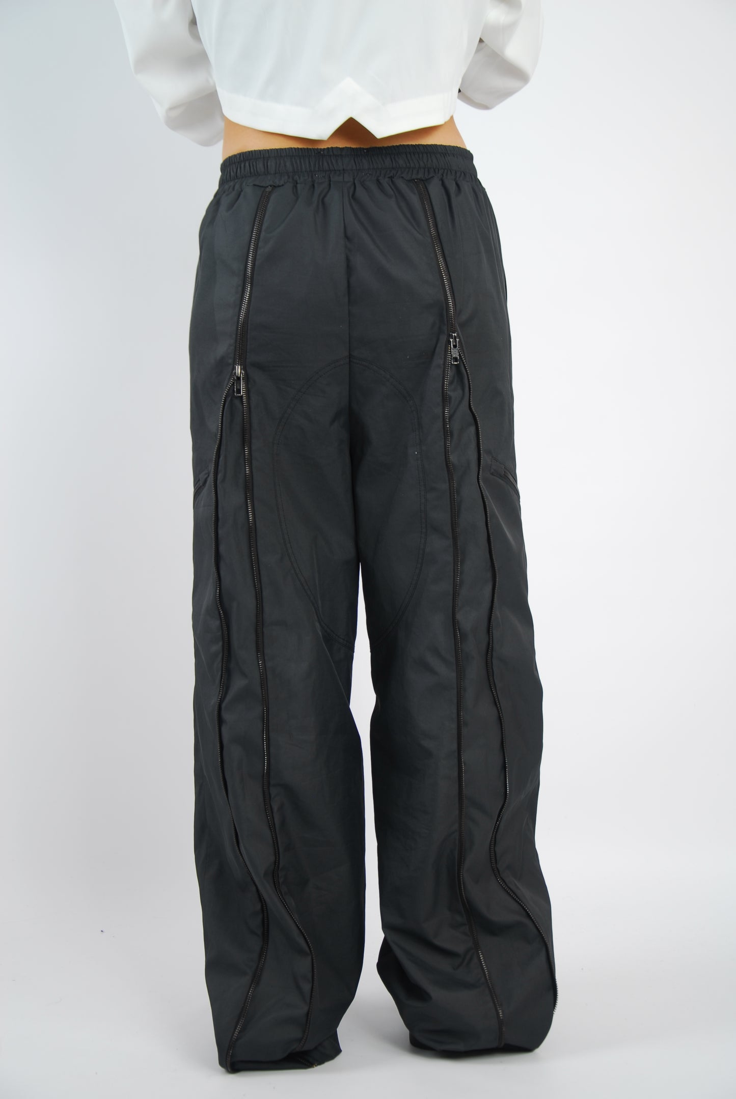Alcyus- black track pants from the top to buttom zip