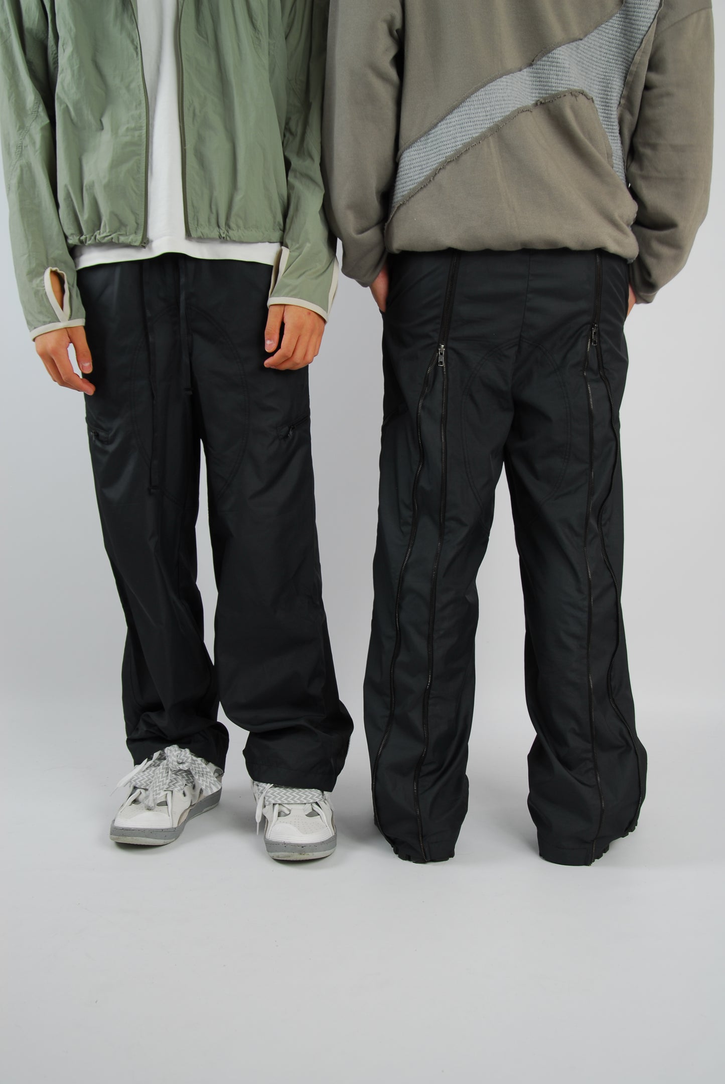 Alcyus- black track pants from the top to buttom zip